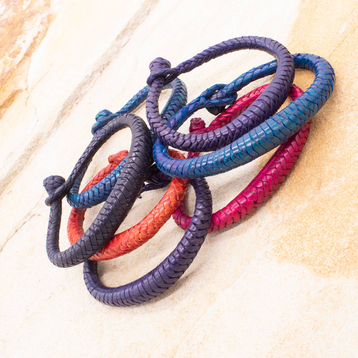 Multi-bracelet, thin black synthetic leather strip, colourful laces